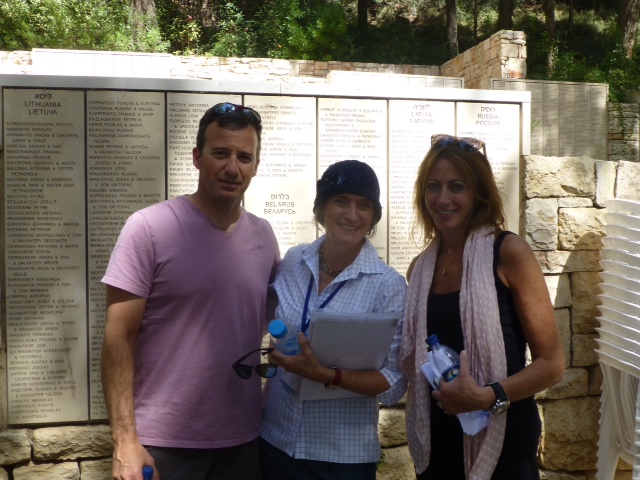 Jim Aronovitz and Carolyn Bellinson with their guide (center) at Yad Vashem