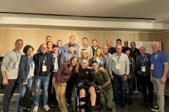 The mission participants with Avishai Shoshani, a wounded soldier